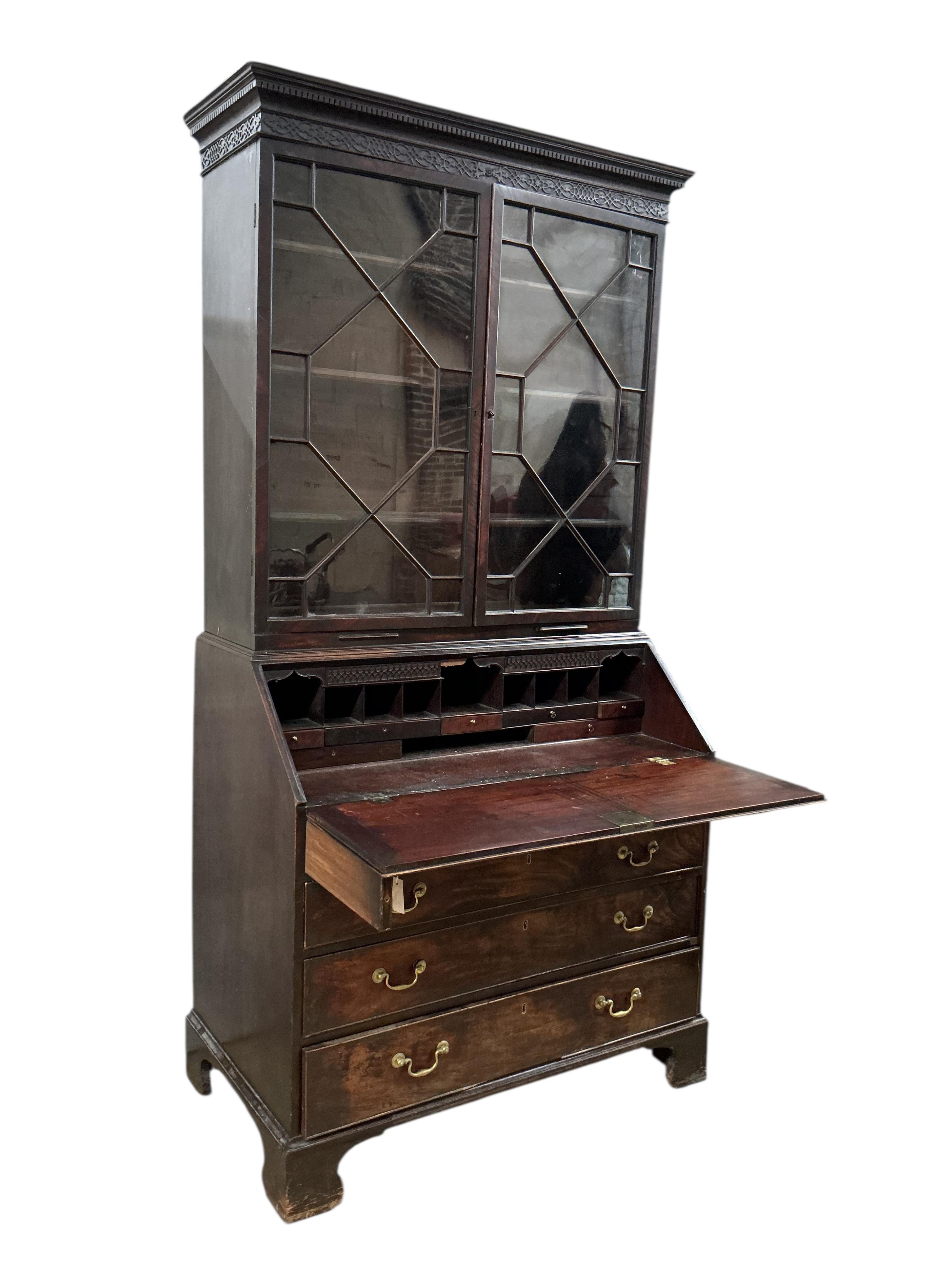 A George III mahogany bureau bookcase, width 112cm, depth 61cm, height 218cm
